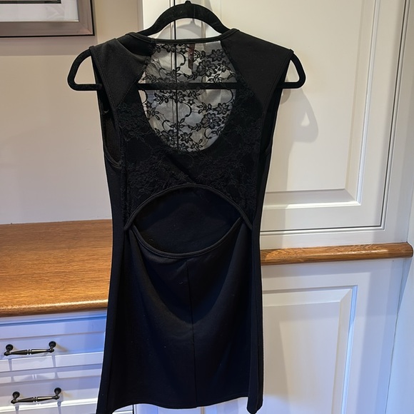 Girls large black dress size Large. Lace and cutout detail in back. - Picture 2 of 2